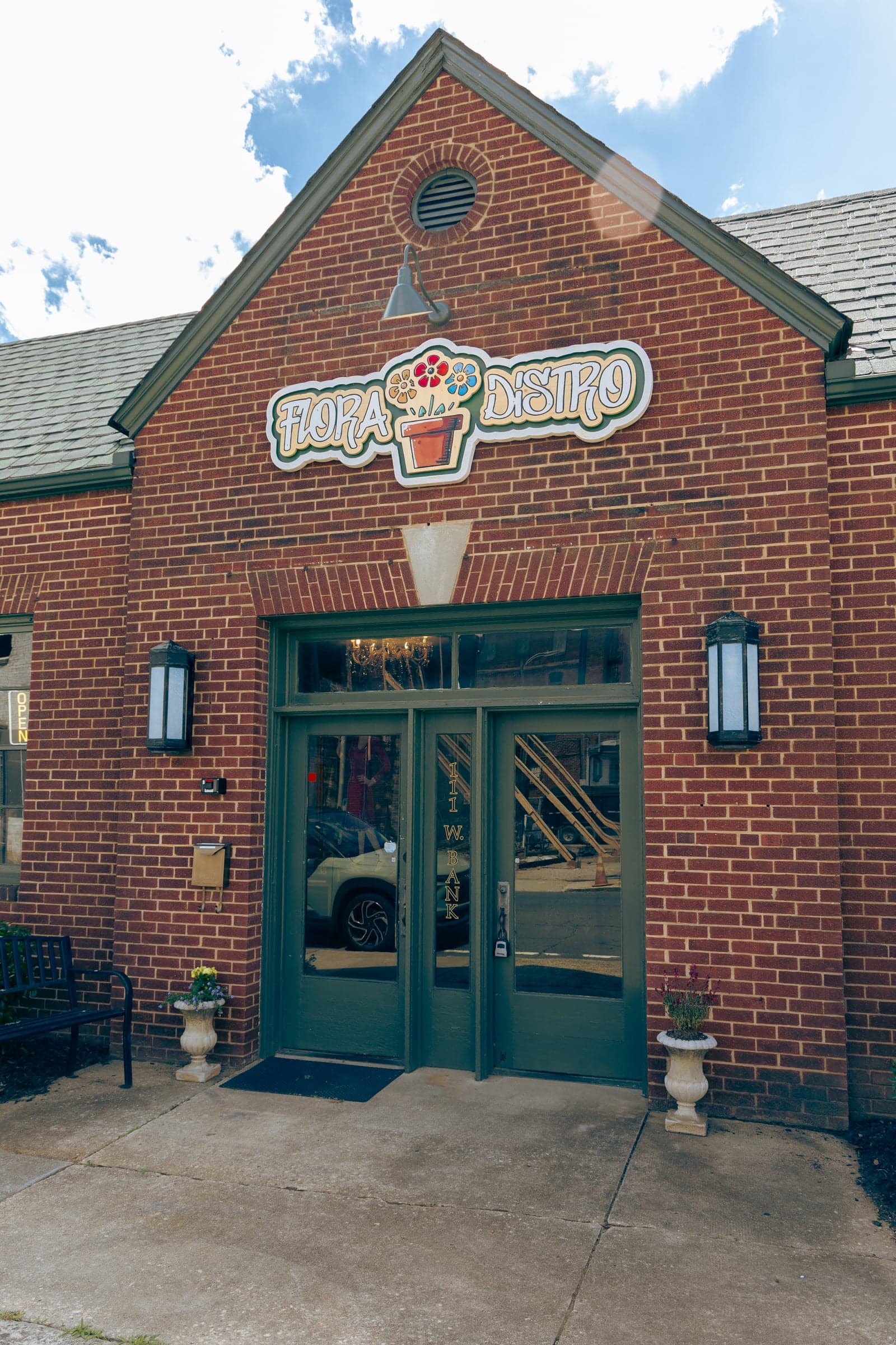 Salisbury storefront with brick facade and green doors